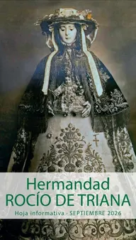 Virgen del Rocío vestida con manto bordado y tocado floral, sosteniendo al Niño Jesús también vestido con ropajes ornamentados